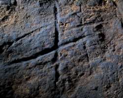 There are also some scratches found on the floor of the caves which include eight lines consisting of two groups of three long lines and two short lin